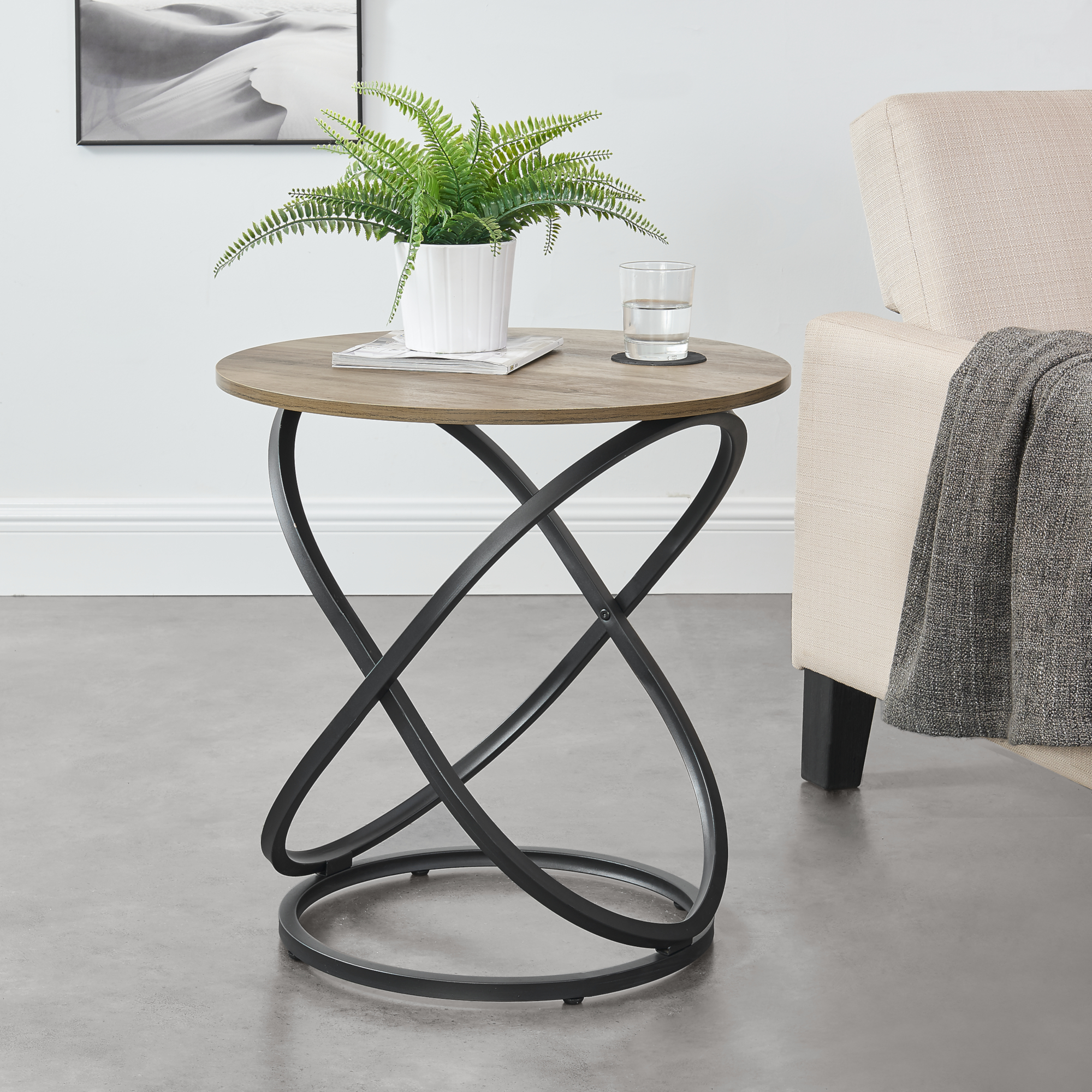 Tavolino da Salotto Lumsden con Piano Rotondo Ø59 cm e Base Spirale - Effetto Legno / Nero [en.casa]
